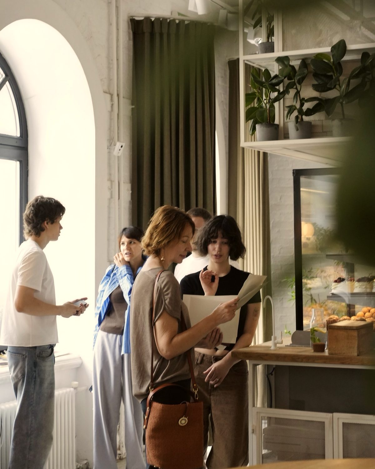 A queue of guests at the counter at peak time